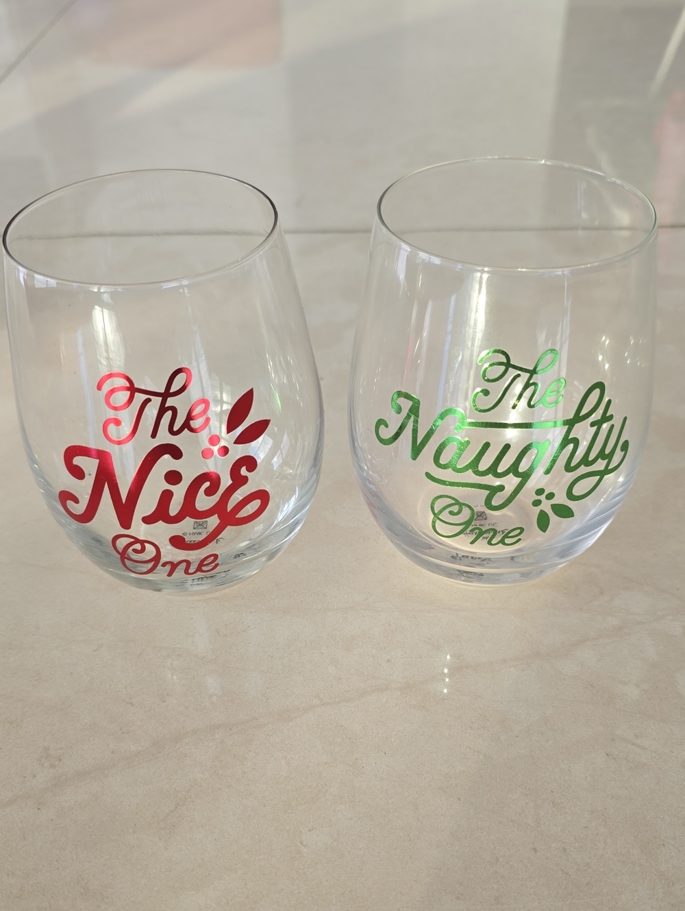 Nice & Naughty Holiday Stemless Wine Glass Set - Two Glasses - Red & Green Font